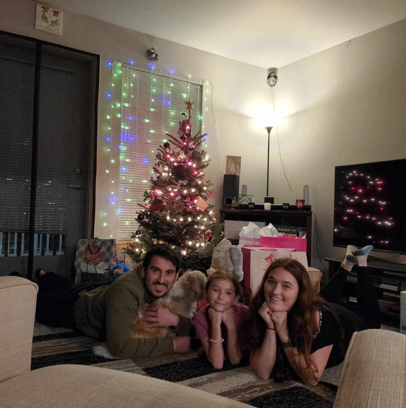 Kyden, JJ, and Elisa celebrating christmas